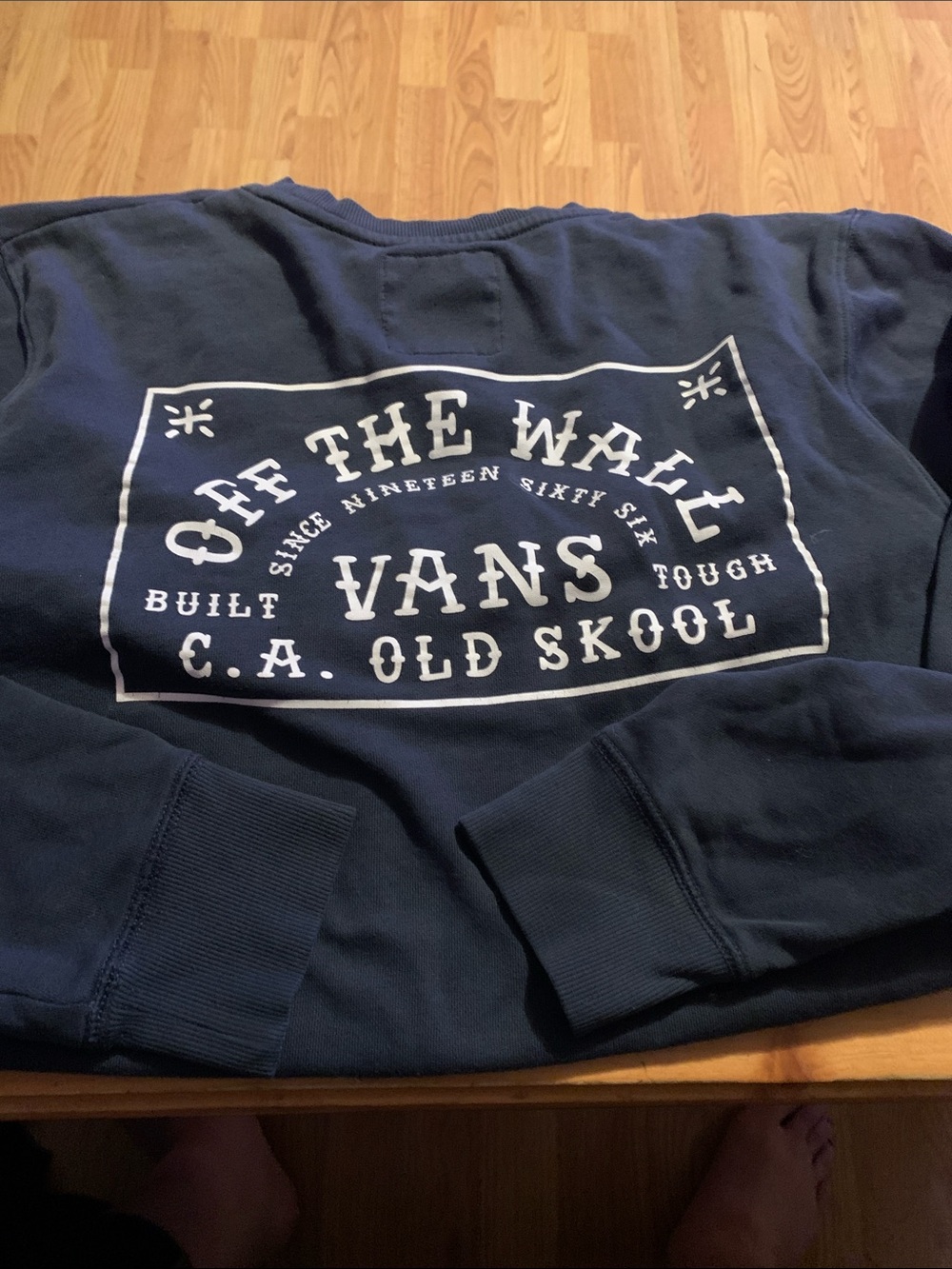 Vans Navy Pullover Sweatshirt with White 'Off The Wall' Graphic